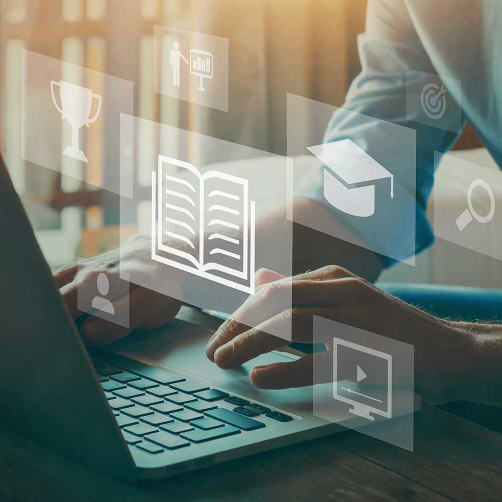 ALS ACADEMY, Ein Laptop und Icons die zum Thema lernen passen