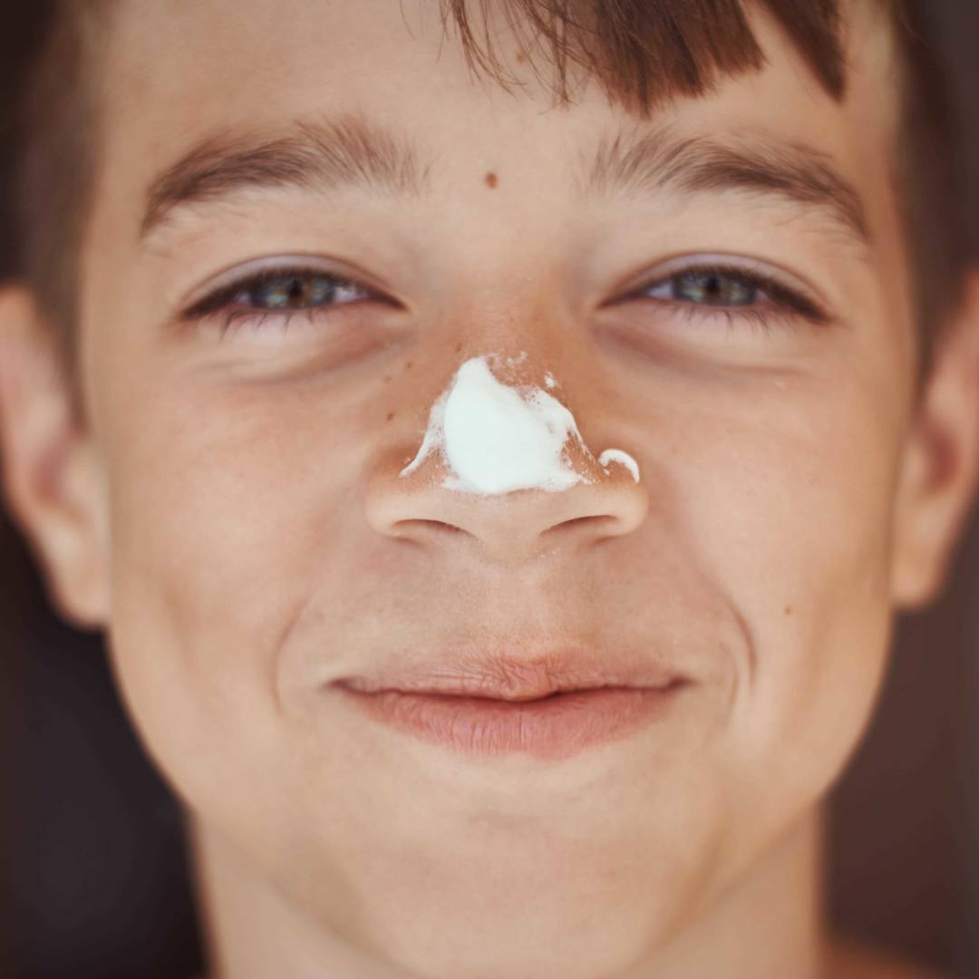 Écran solaire pour garçon