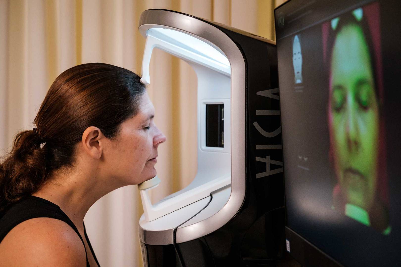 Clinical testing panelist being undergoing skin analysis