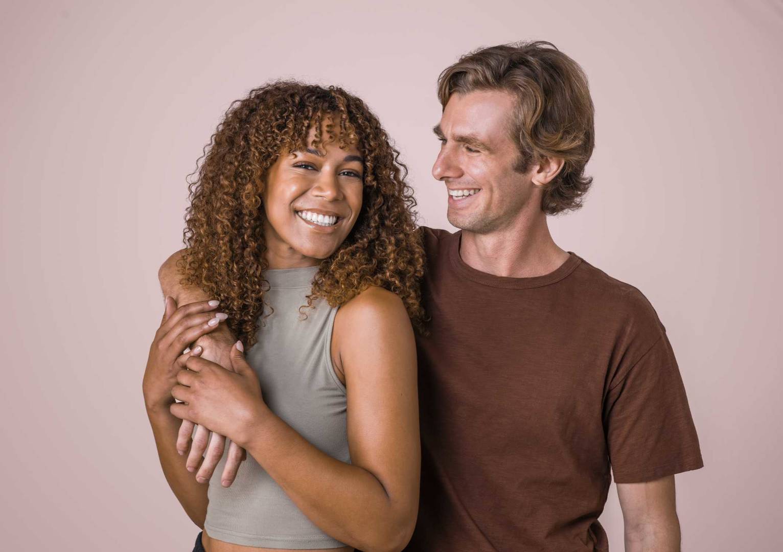 Female and male clinical testing panelists smiling