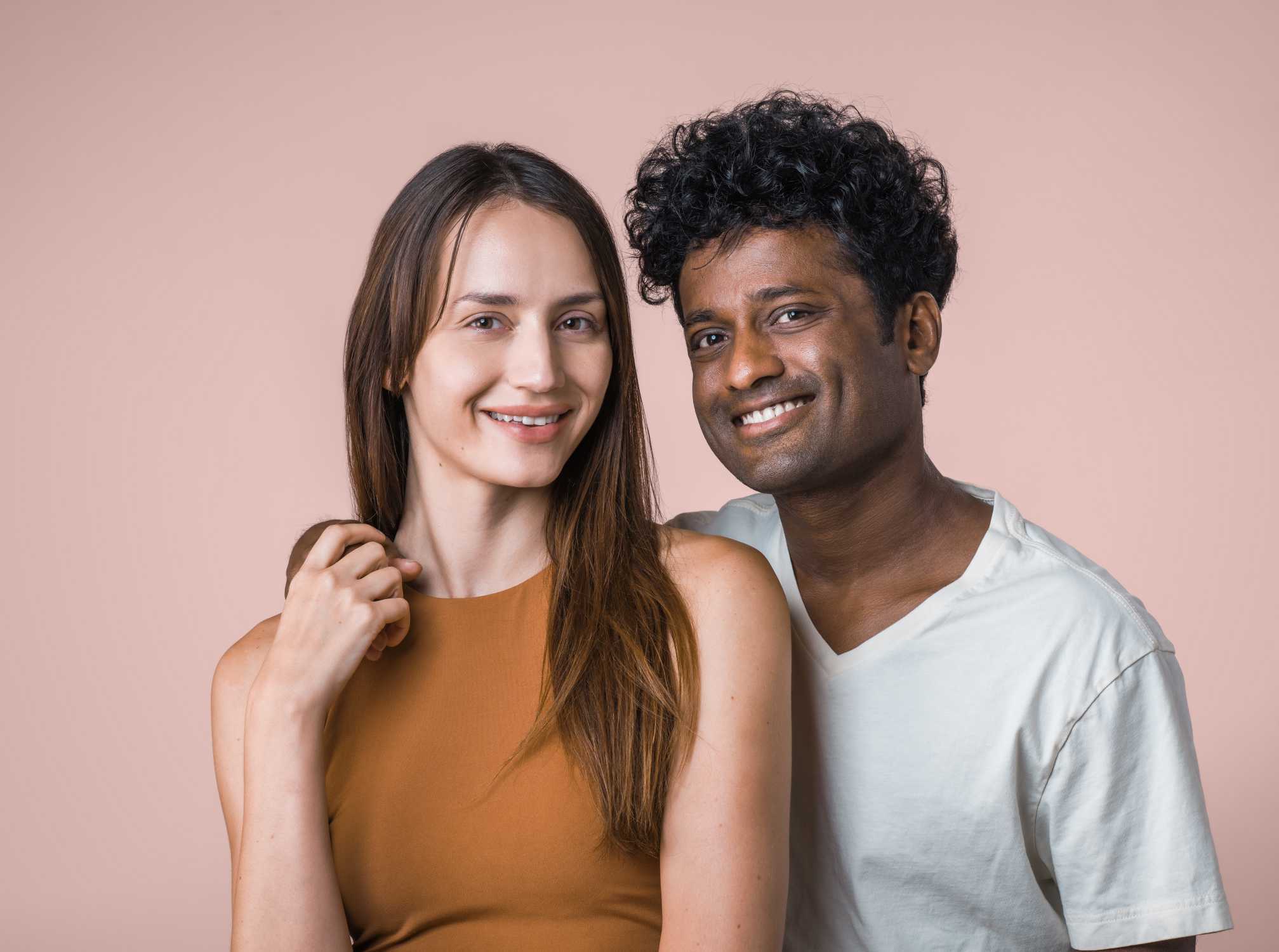 Female and male clinically testing panelists standing together, smiling